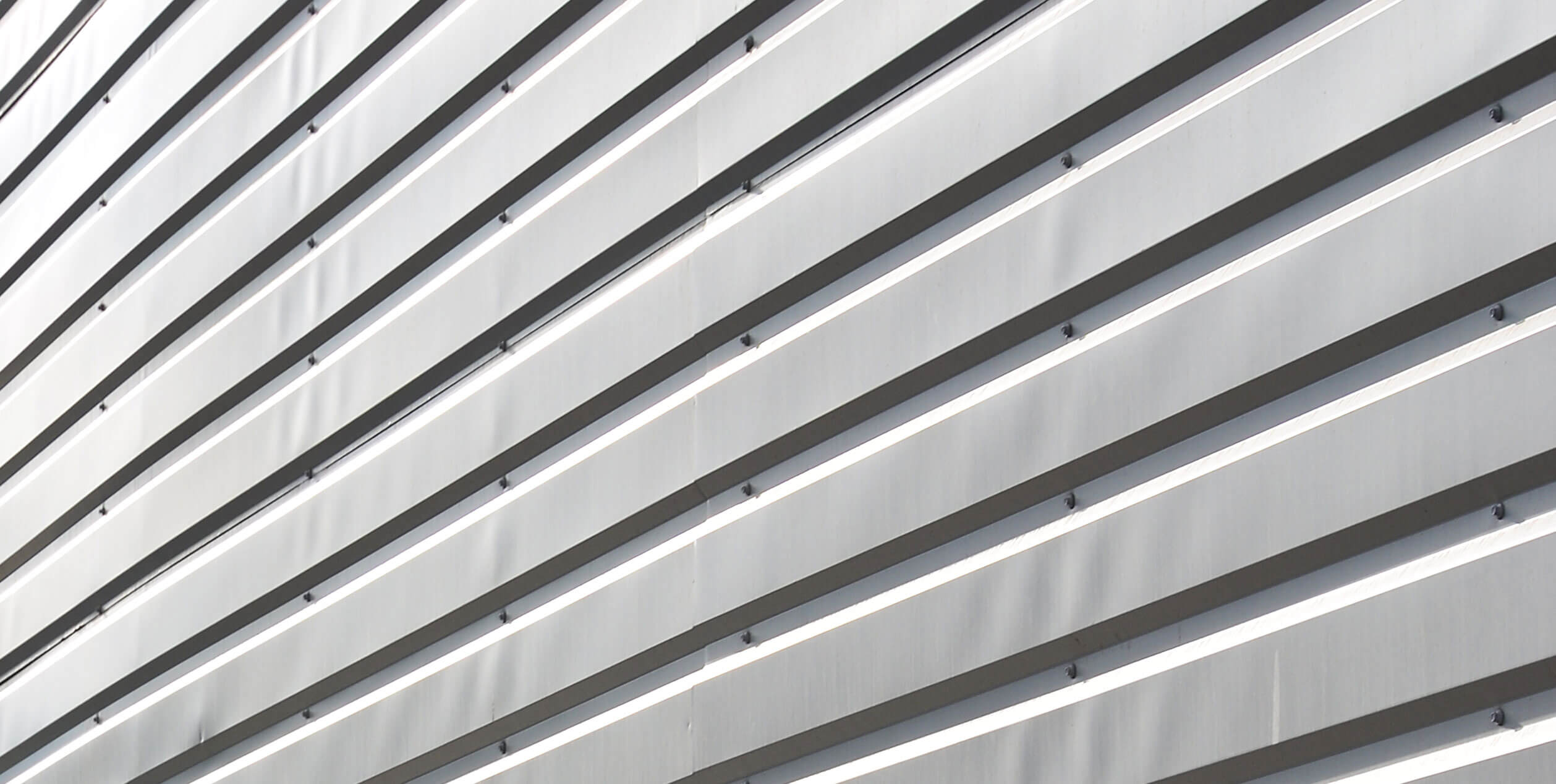 What is Oil Canning in Metal Roofing and Siding?